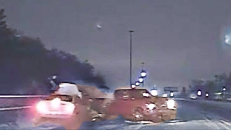 Dash cam video shows officer, driver struck by car